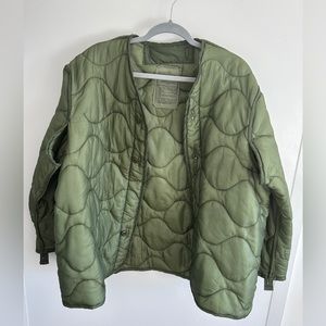 Green quilted jacket